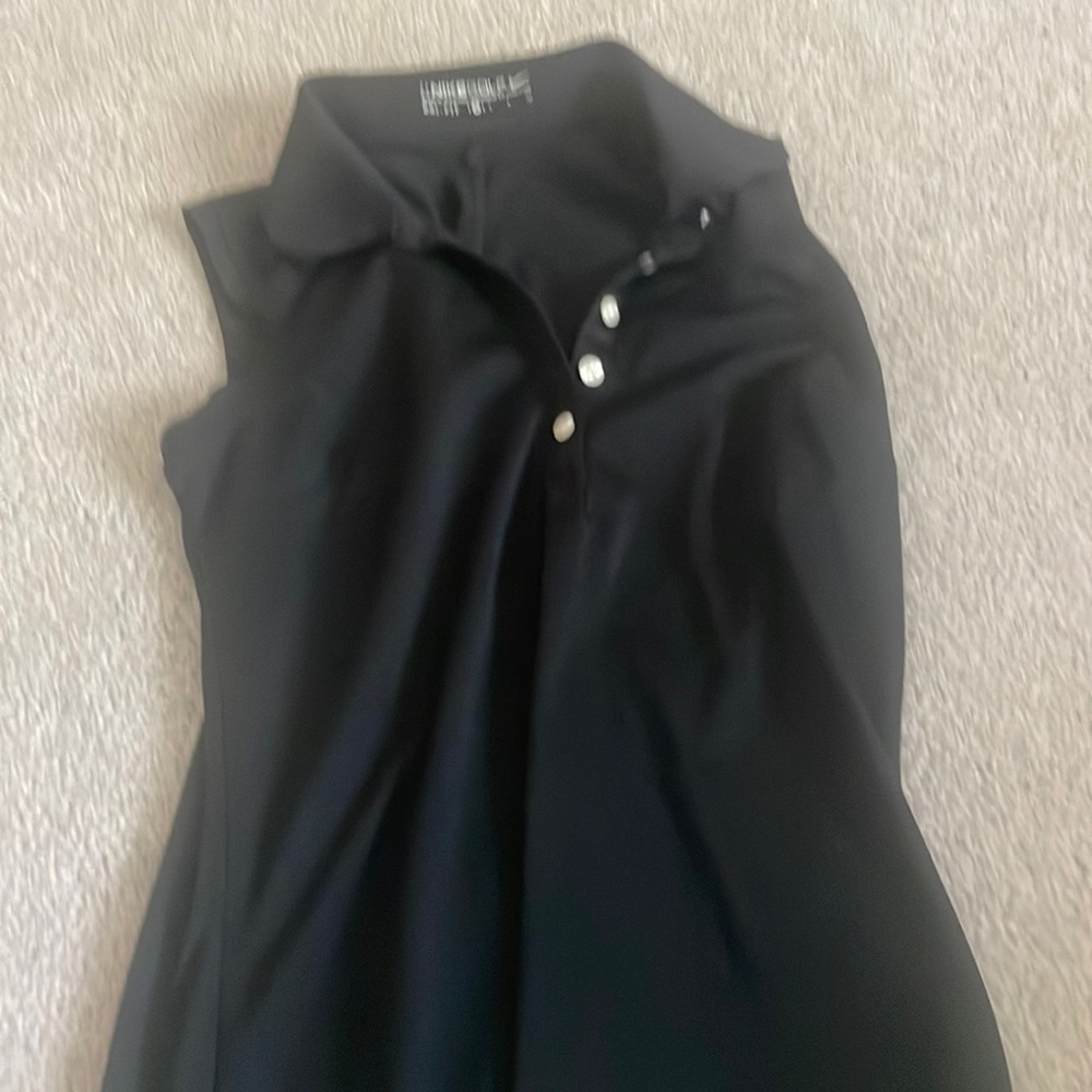 Black Nike sleeveless golf shirt